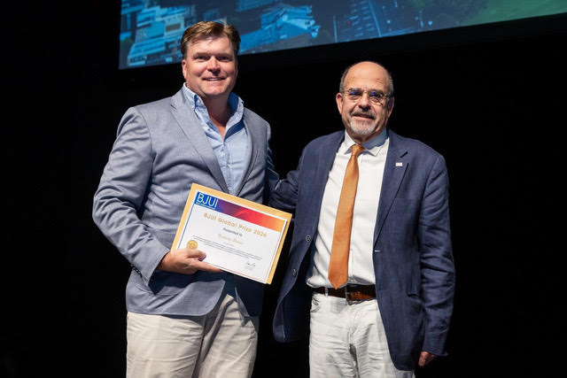 Dr Nick Brown of VIRQ accepting the BJUI Global Prize